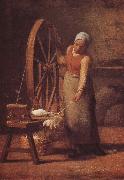 The woman weaving the sweater